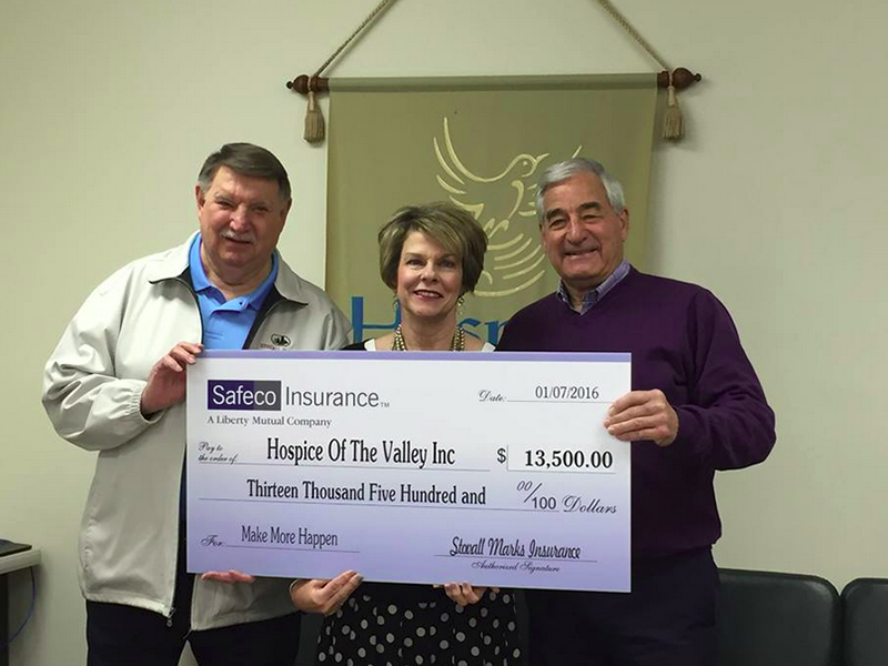 Stovall Marks Insurance with check for Hospice of the Valley.